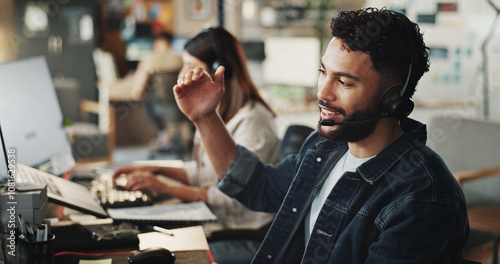 Headset, tech support and man in office with discussion, online advice and website management. Virtual assistant, customer service agent and IT consultant on call with computer, help and sales pitch