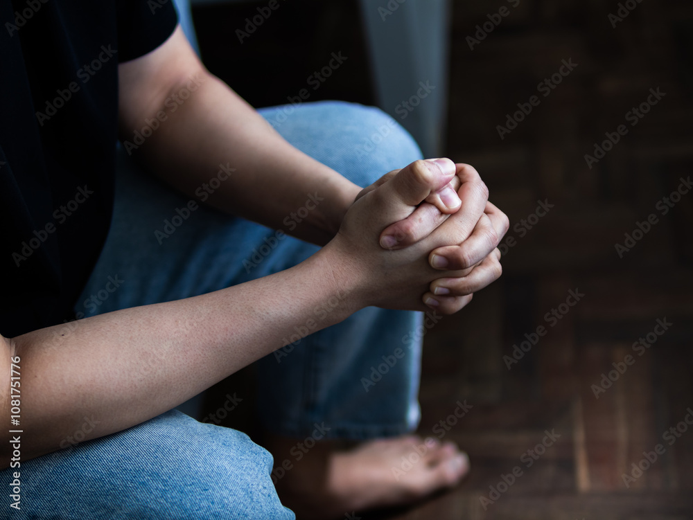 Contemplative individual in casual attire indoor setting emotional reflection natural light close-up perspective Contemplative individual in casual attire indoor setting emotional reflection natural light close-up perspective