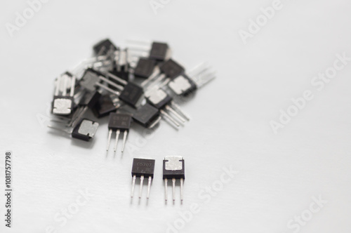 Semiconductor transistors and mosfets isolated on white background.