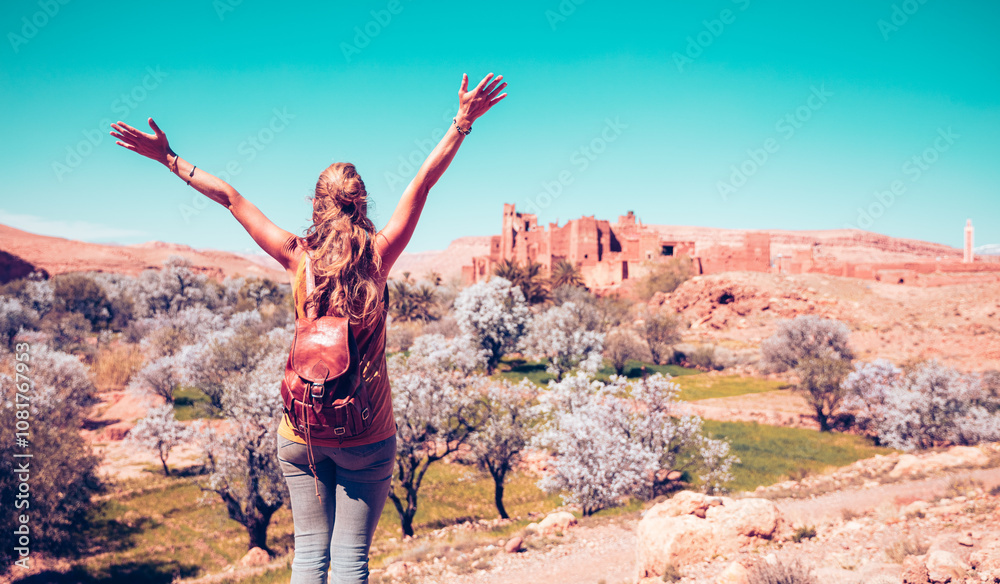 Happy traveler woman in Morocco, old Kasbah