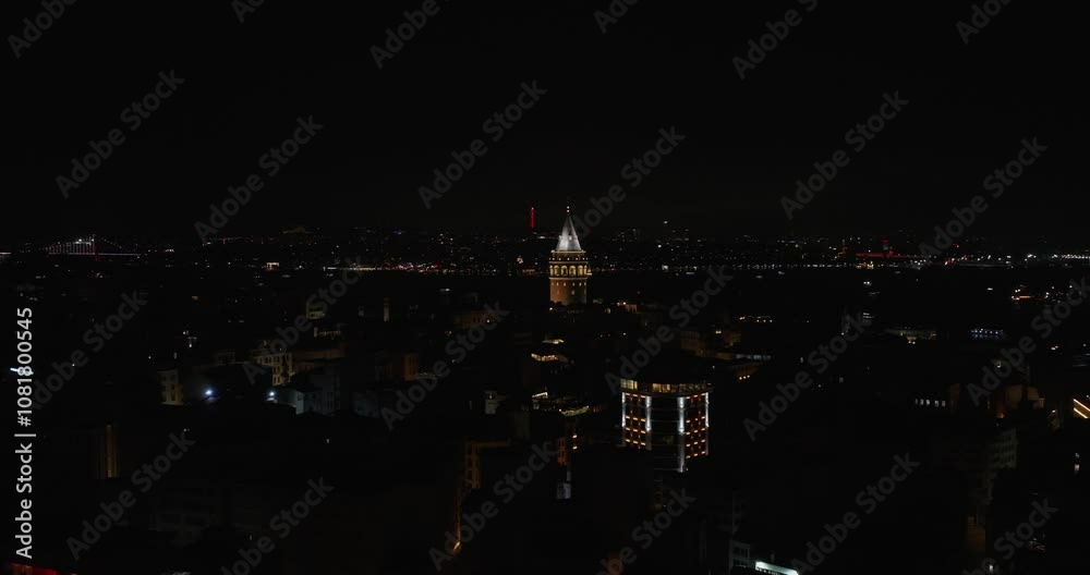 Aerial Boom Shot Reveals Galata Tower, Istanbul's Top Tourist Attraction. Night Aerial Boom Shot Reveals Galata Tower, Istanbul's Top Tourist Attraction. Night