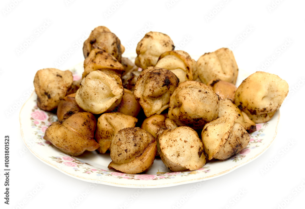 fried dumplings in a plate on a white background fried dumplings in a plate on a white background