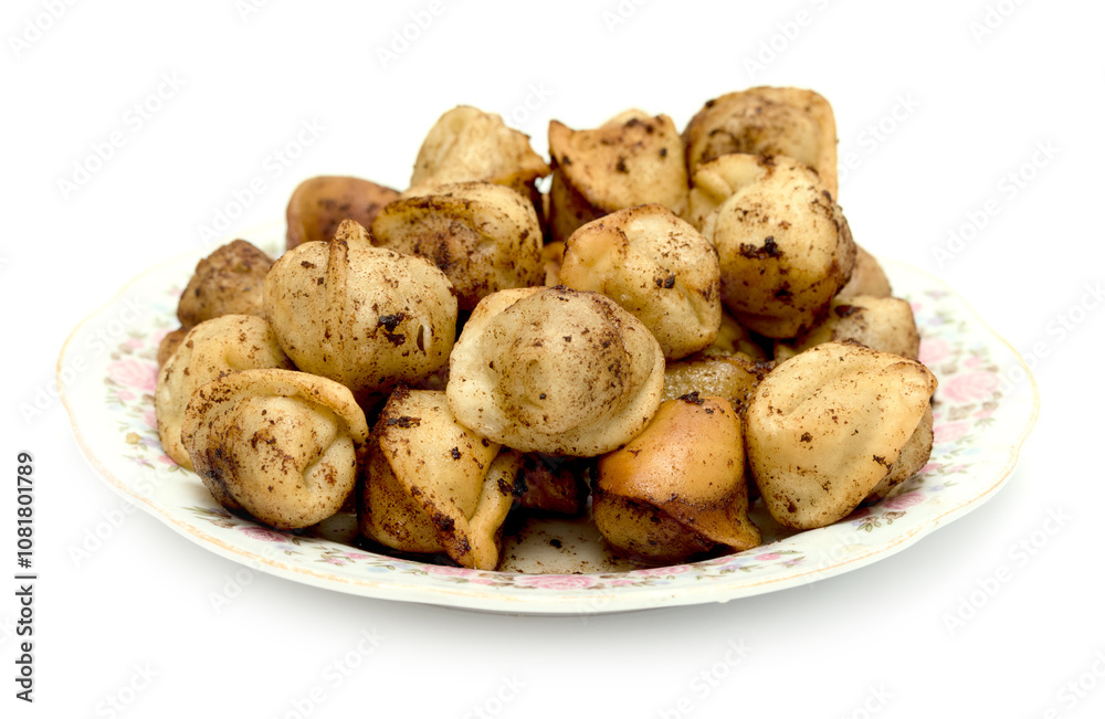 fried dumplings in a plate on a white background fried dumplings in a plate on a white background