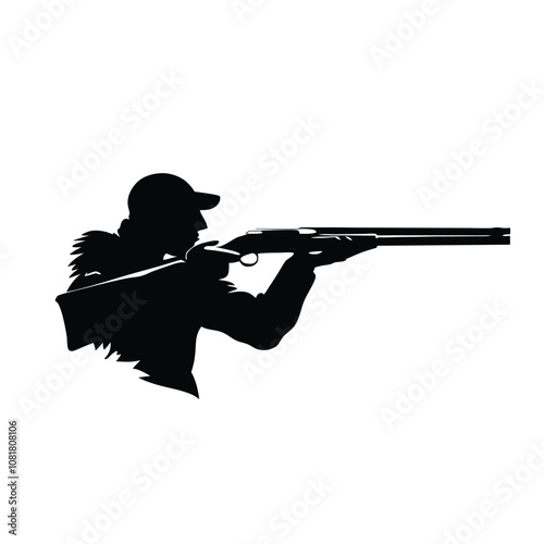 A man is holding a shotgun. He is wearing a hat. The hat is black. The jacket is black