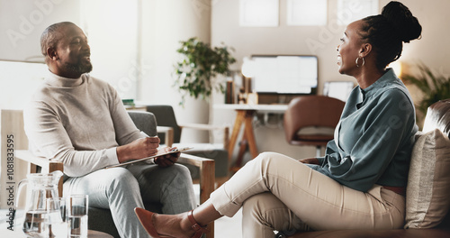 Black people, therapist or consulting with client for therapy session, discussion or counselling at office. African, man and woman with smile or help for friendly chat, emotion or therapeutic advice