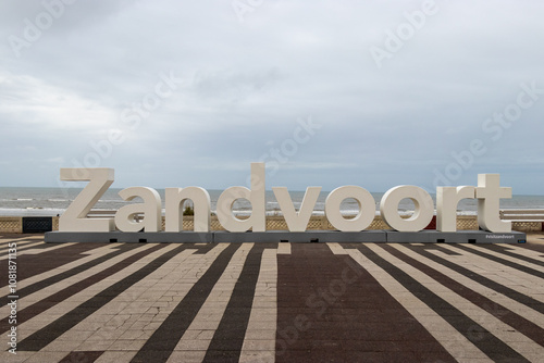 zandvoort Beachfront Sign with Geometric Tile Pattern on Cloudy Day: Coastal Landmark at the Dutch Seaside