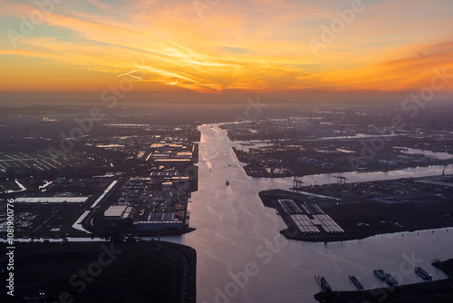 Photography Aerial view of canal with port harbor outside Amsterdam during sunrise