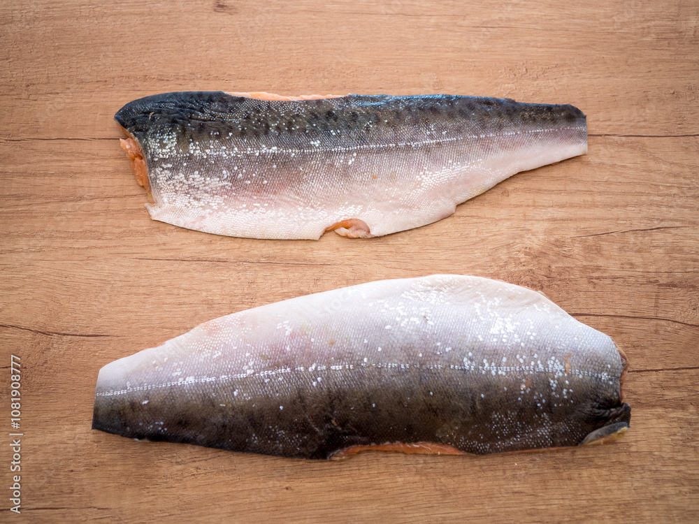 Salmon fillets ready for processing in the kitchen. Salmon is one of the most nutritious types of fish that offers several health benefits.