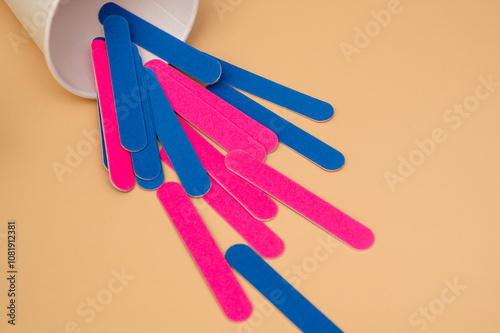 A set of manicure nail files with the same abrasive, highlighted on a light background.