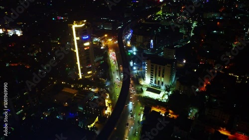 Night time 4K Ariel shot of newly constructed Banerghatta road metro line in Bangalore city, India photo