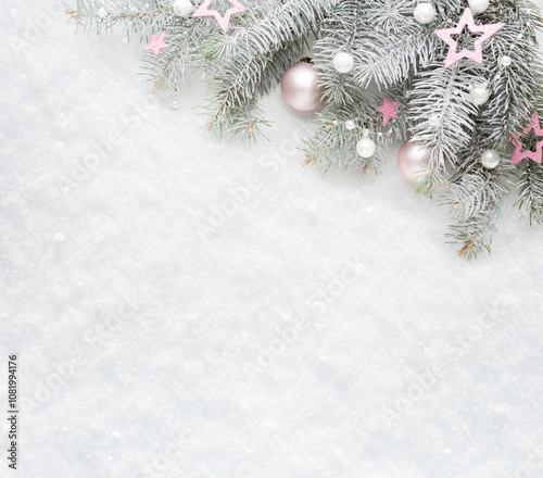 Obraz na płótnie Christmas and New Year background. Christmas tree branches with decorations on the background of natural snow with empty space for text. Flat lay. w salonie
