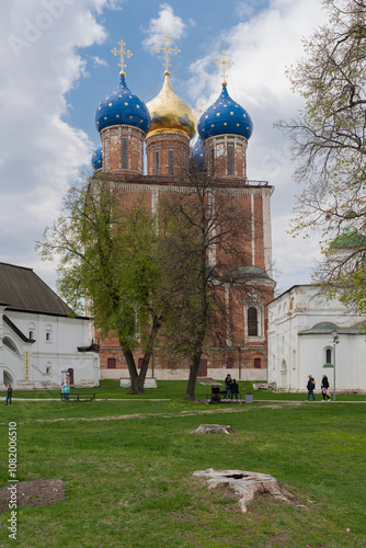 Ryazan, Russia - May 8, 2022: View of the inner courtyard of the Ryazan Kremlin with the Assumption Cathedral in the background. Springtime. Vacationing tourists. High quality photo photo