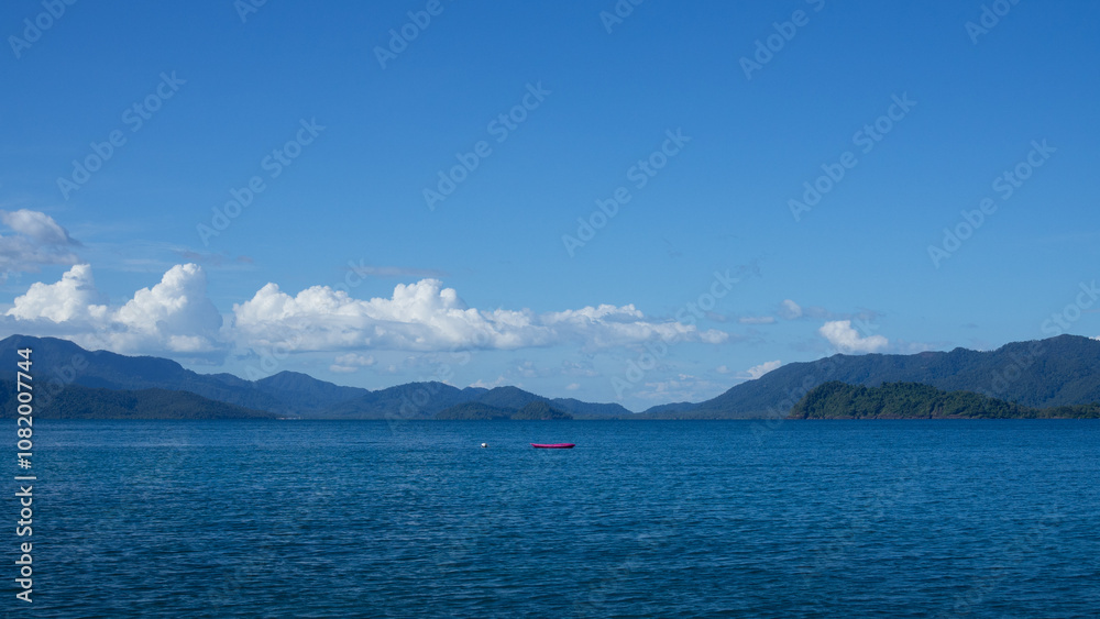 The beautiful ocean sparkled under the sunlight. The beautiful ocean sparkled under the sunlight.