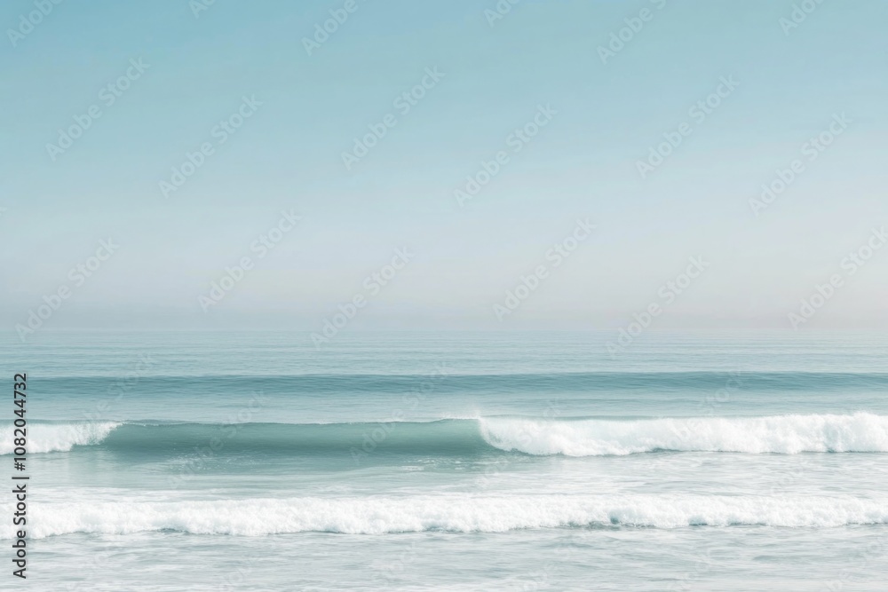 Fototapeta premium A person rides a surfboard on a sunny beach, ready for action