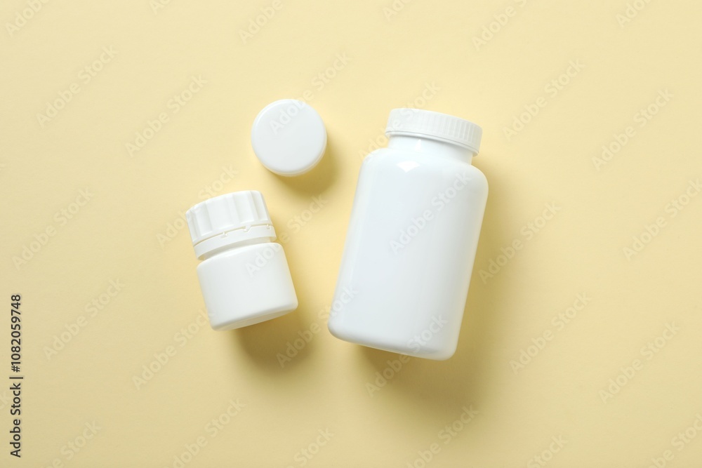 White bottles on color background 