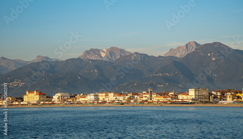 Viareggio, Lucca, Italy: the city seen from the sea in winter, with the coastline, the skyline and the Apuan Alps in the background