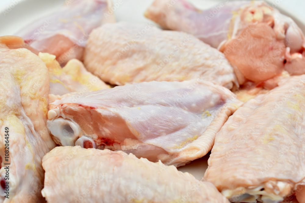 Close-up pieces of chicken meat ready for cooking. Close-up pieces of chicken meat ready for cooking.