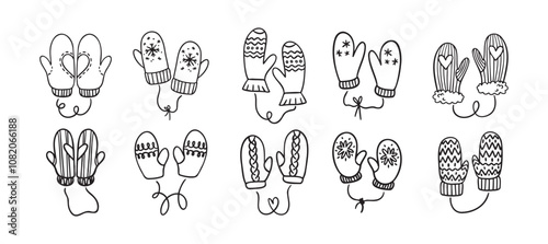 Hand drawn winter mittens. Doodle cute mittens elements black on white.