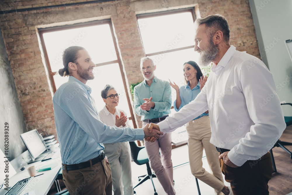 Fototapeta premium Photo of teamwork people working together shake hands deal comfortable modern office loft room interior indoors workspace