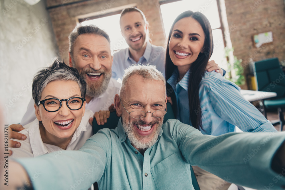 Photo of teamwork startup partners take selfie photo hello cheerful smile comfortable nice creative startup office loft room interior