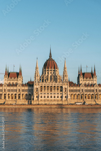 hungarian parliament building from across the river with blue sky  photo