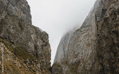 view of foggy canyon in mountainous range of azerbaijan photo