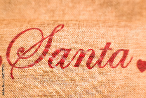 Obraz na płótnie Inscription on a jute bag, Santa Claus, Christmas
w salonie