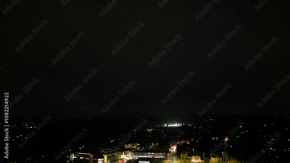 High Angle View of Illuminated North Watford City Which is Located in North London During Cold and Cloudy Night of November 14th, 2024. Drone's Camera Footage. High Angle View of Illuminated North Watford City Which is Located in North London During Cold and Cloudy Night of November 14th, 2024. Drone's Camera Footage.
