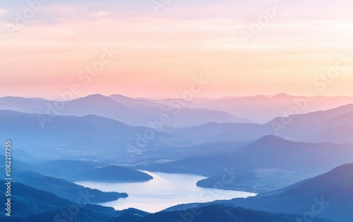 Sunset over mountains with a lake in the foreground, soft pastel colors in the sky. 