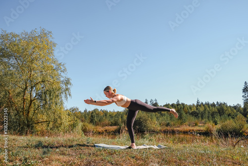 Workout. Fitness, outdoor workout in nature. Fitness, motivation for working the gym, health improvement. Woman doing sports outdoors,wellness, Health, nature, fitness, eco-fitness. mental health. photo