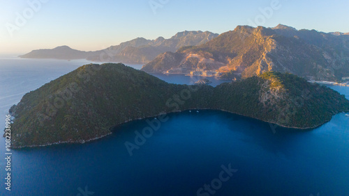 Fototapeta Naklejka Na Ścianę i Meble -  Drone aerial view of Marmaris and the mountains around during sunrise