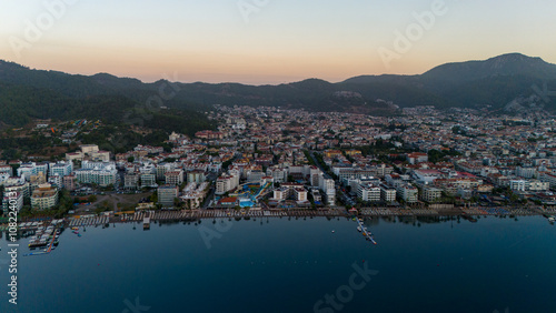 Fototapeta Naklejka Na Ścianę i Meble -  Drone aerial view of Marmaris and the mountains around during sunrise