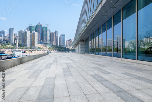 Empty floor square and cityscape with skyline in modern city