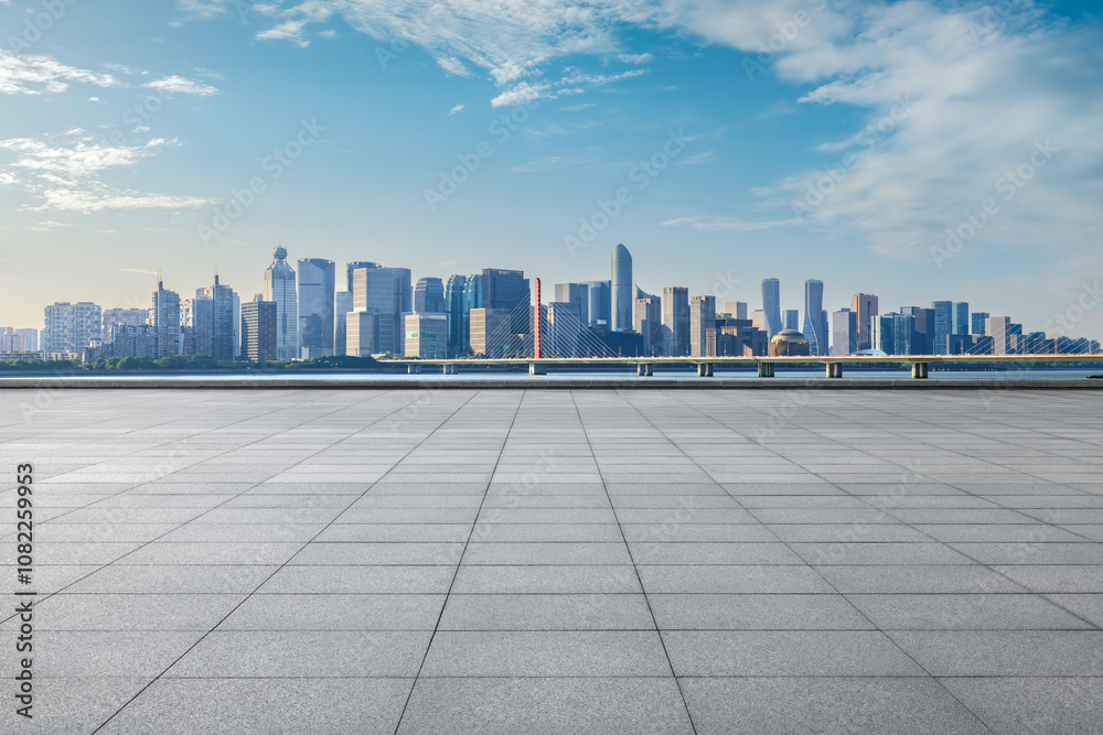 Empty floor square and cityscape with skyline in modern city Empty floor square and cityscape with skyline in modern city