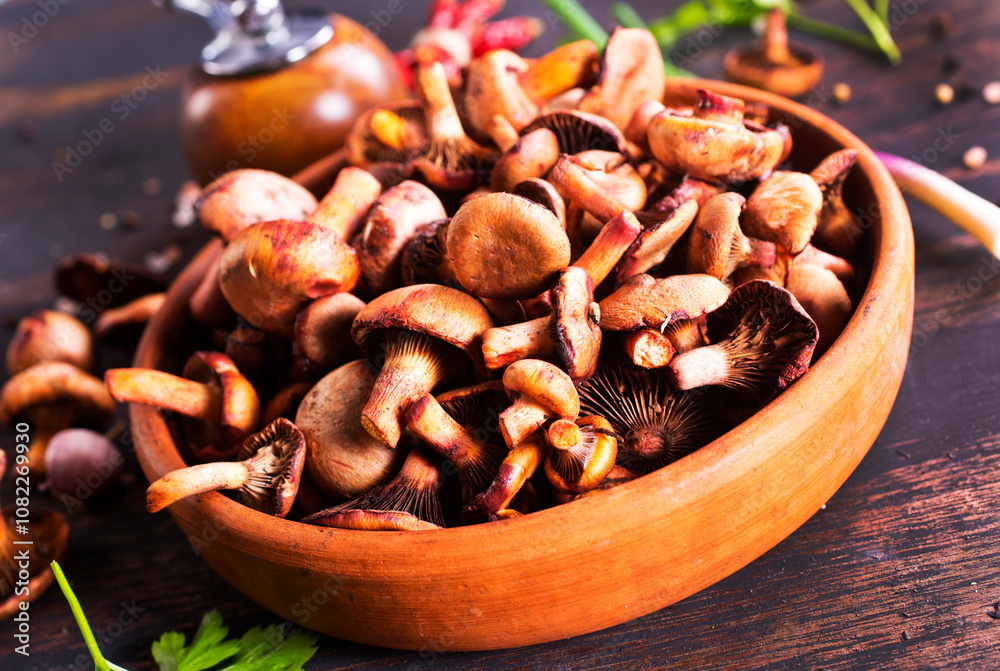 edible mushroom in bowl on a table edible mushroom in bowl on a table