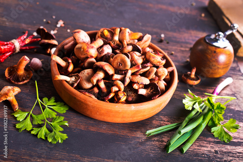 edible mushroom in bowl on a table photo