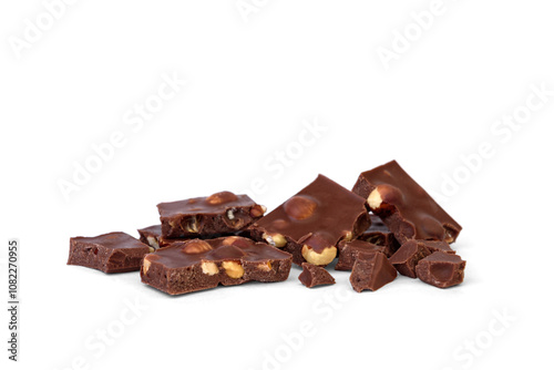 Milk chocolate with hazelnuts isolated on white background.