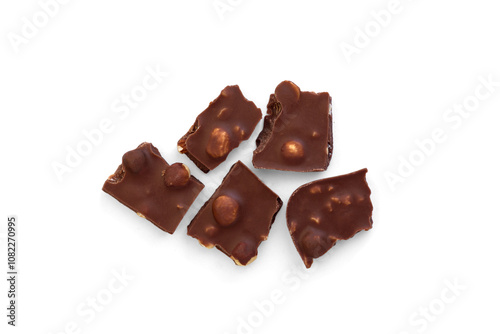 Milk chocolate with hazelnuts isolated on white background.