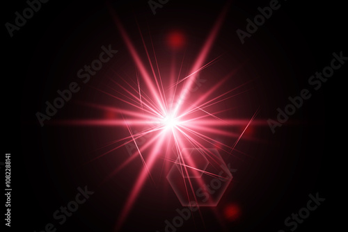 Beautiful optical red lens flare burst isolated on a black background