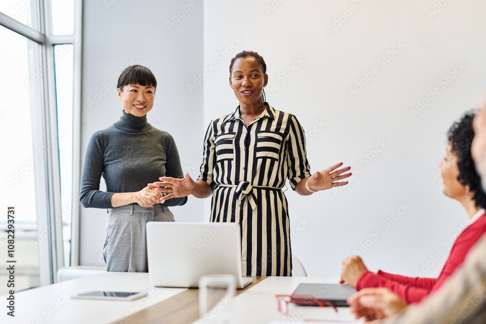Obraz premium business meeting businesswoman office teamwork woman introduction greeting employee new colleague congratulating newcomer asian japanese