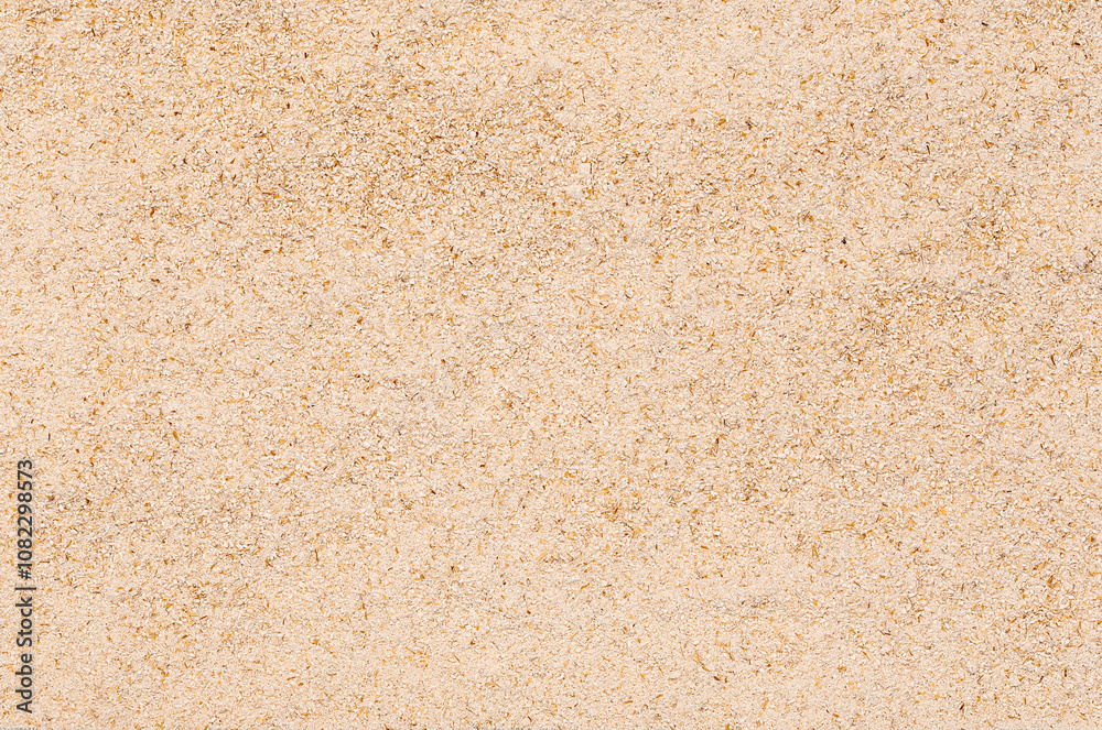 Macro photography of coarse whole-grain oat flour, raw ingredient, dietary fiber, bran, gluten, grounded oatmeal Macro photography of coarse whole-grain oat flour, raw ingredient, dietary fiber, bran, gluten, grounded oatmeal