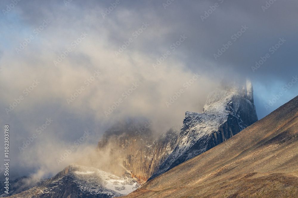 View of Ulamertorsuaq mountain and the view of surrounding mountains and glaciers in Tasermiut fjord (South Greenland) View of Ulamertorsuaq mountain and the view of surrounding mountains and glaciers in Tasermiut fjord (South Greenland)