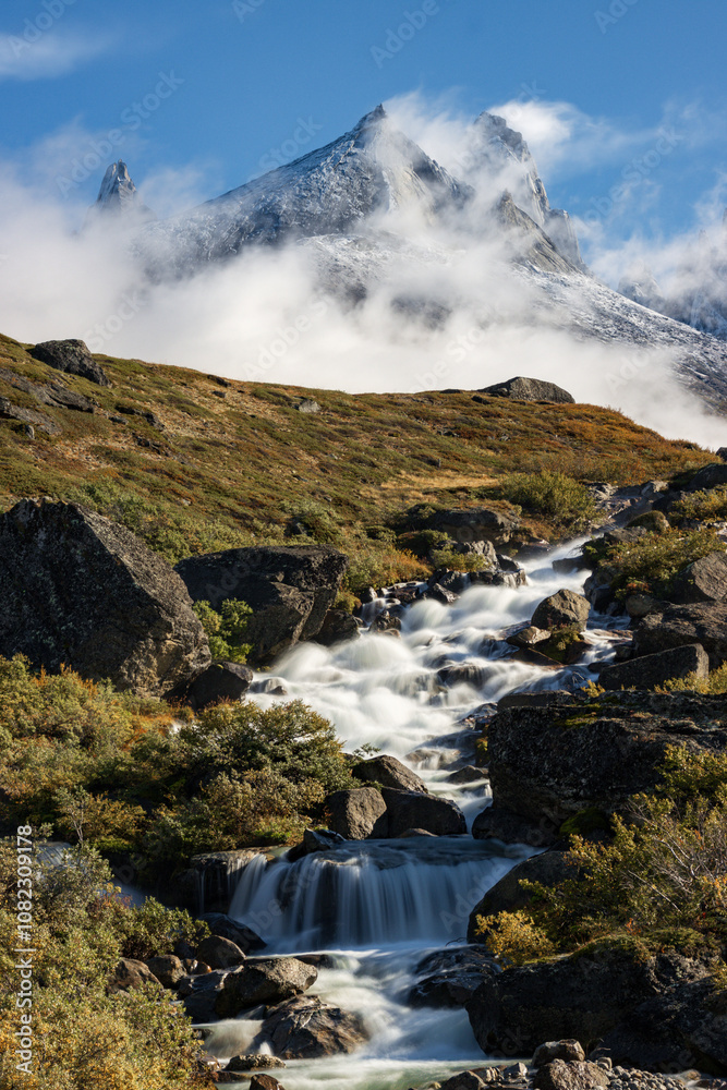 Obraz premium View of Ulamertorsuaq mountain and the view of surrounding mountains and glaciers in Tasermiut fjord (South Greenland)
