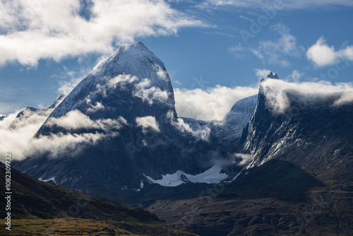 View of Ulamertorsuaq mountain and the view of surrounding mountains and glaciers in Tasermiut fjord (South Greenland) 