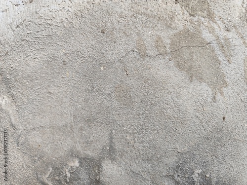 Rough gray concrete wall background with aged textured surface