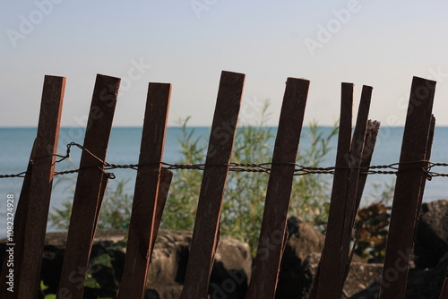 wooden fence on a beach