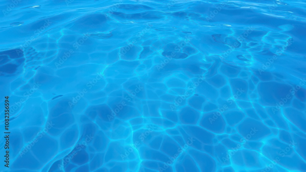 Rippling surface of deep blue sea with sunlight reflecting, creating a mesmerizing texture, water, mesmerizing, blue Rippling surface of deep blue sea with sunlight reflecting, creating a mesmerizing texture, water, mesmerizing, blue