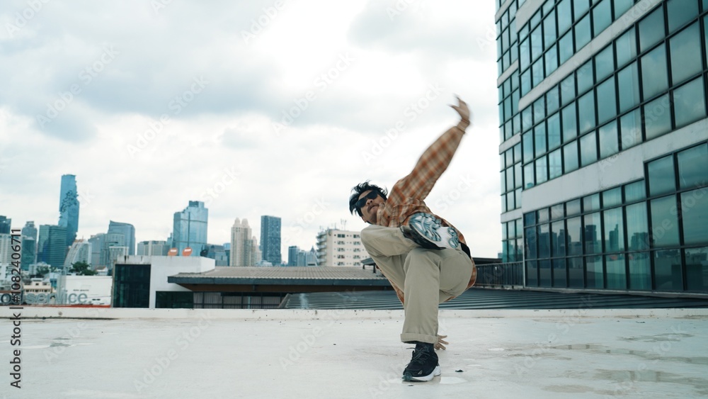 Happy hispanic dancer wears casual outfit break dancing at urban city. Energetic hip-hop performance. Choreographer move along the freestyle beat. Hip hop dancing. Outdoor sport 2024. Hiphop. Happy hispanic dancer wears casual outfit break dancing at urban city. Energetic hip-hop performance. Choreographer move along the freestyle beat. Hip hop dancing. Outdoor sport 2024. Hiphop.