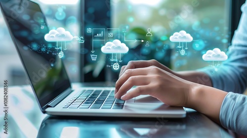 A person typing on a laptop with cloud computing icons floating above, symbolizing digital connectivity.