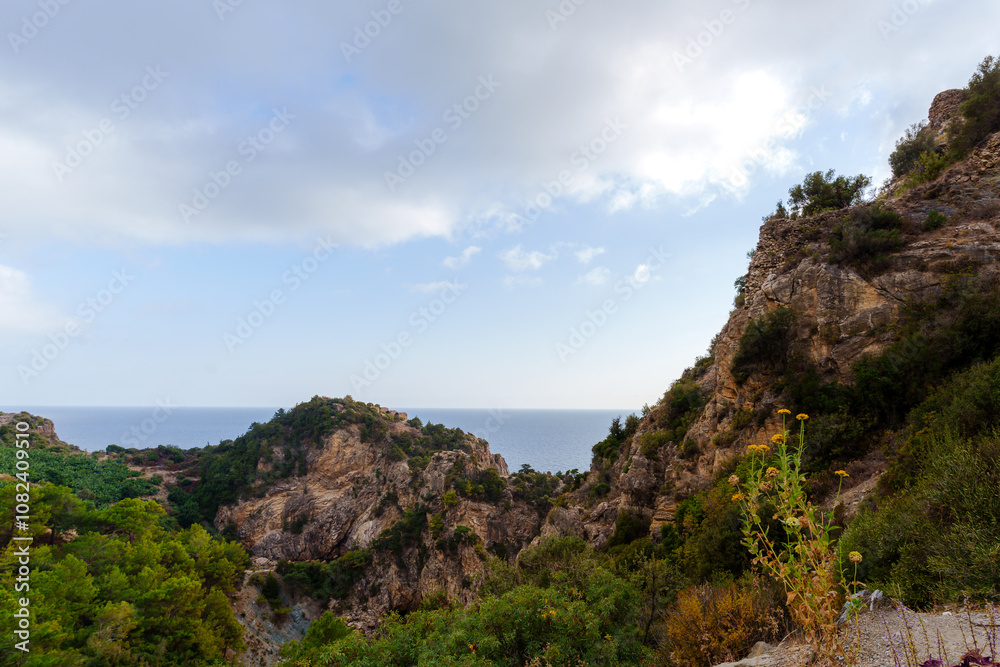 A breathtaking view of a rugged Mediterranean coastline A breathtaking view of a rugged Mediterranean coastline